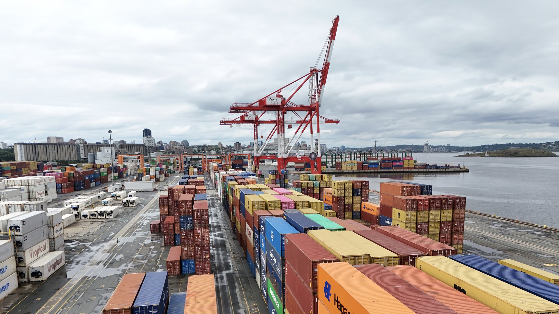 Stacked shipping containers at a Canadian port